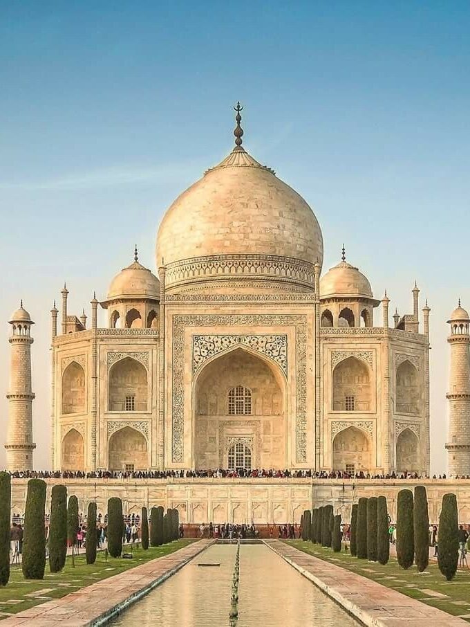 Taj Mahal in Agra, India, viewed across the formal Mughal gardens